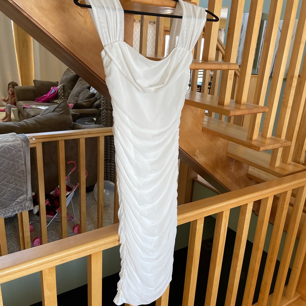 White tight fitting midi dress